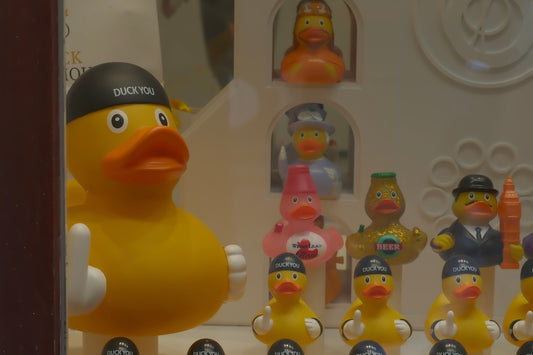 Yellow rubber duck wearing a black hat